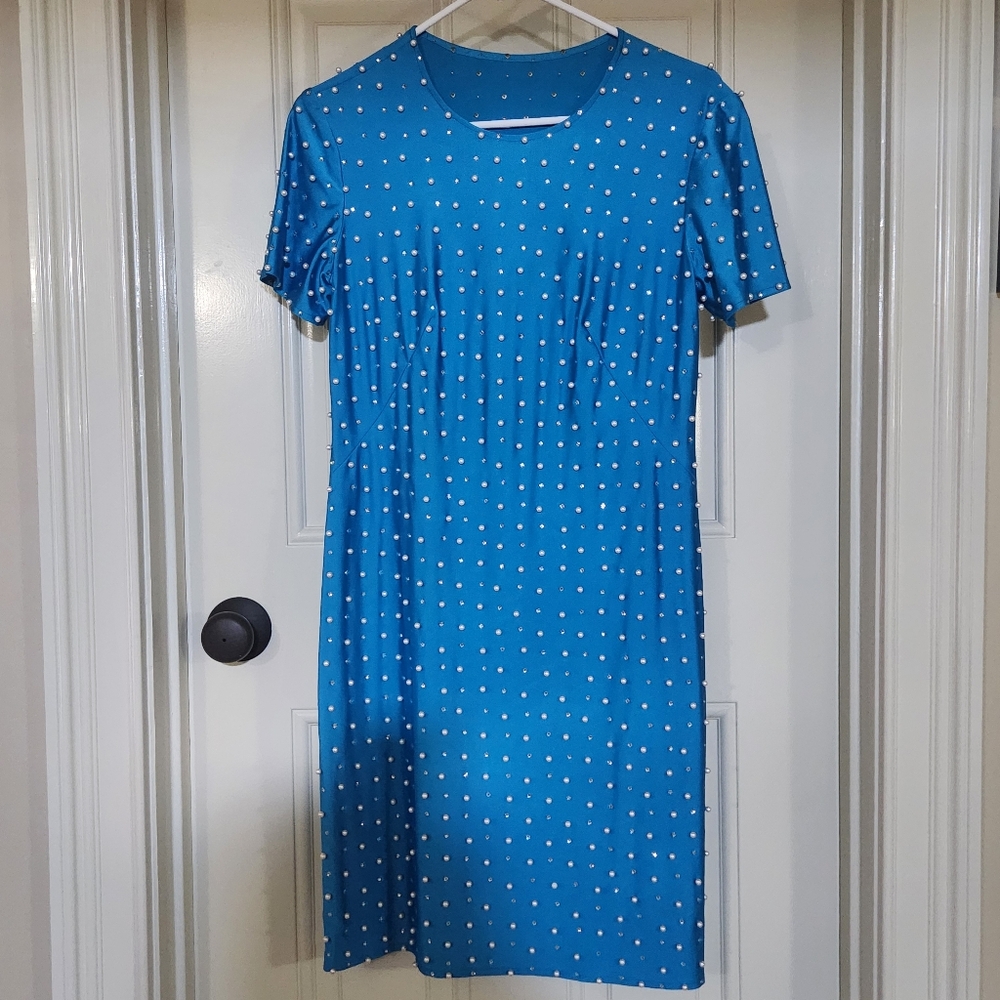 Beautiful vintage blue and beaded cocktail dress size 8.  Excellent condition.